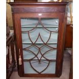 A George III mahogany and satinwood-banded hanging corner cupboard with lattice glazed door, W85cm