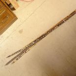 3 African Tribal bentwood archery bows, and various arrows, largest bow length 155cm