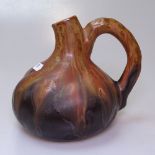 An Art pottery gourd design jug, signed, height 15.5cm