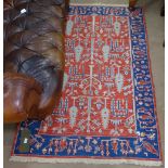 A red ground Persian design rug, 175cm x 117cm