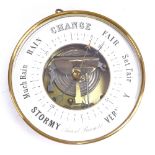 A Vintage circular brass-framed wall-hanging aneroid barometer, diameter 20cm