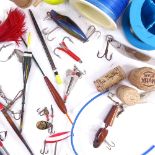 Various fishing equipment, including Swedish abu ellips lure, articulated pike plugs, early floats