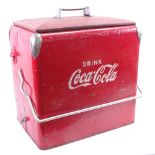 A mid-century Coca Cola red painted tin advertising drinks cooler, lift-out aluminium tray with