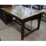 An Antique plank-top kitchen table on H-shaped stretcher, W120cm