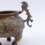 A Chinese bronze censer, dragon handles with Dog of Fo feet and mountain scenes, height 11cm