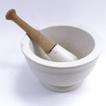 A 19th century Minton white porcelain apothecary pestle and mortar, circa 1873, mortar diameter 20.