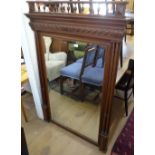 A 19th century walnut rectangular bevelled-edge wall mirror, with double fluted columns, W102cm