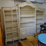 A Continental cream painted 3-section library bookcase, with adjustable shelves, and panelled