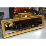 A collection of various pine and other framed mirrors