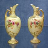 A pair of Edwardian Royal Worcester ewers, 1581, with painted and gilded floral decoration, 12cm