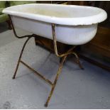 A Hungarian enamel baby's tin bath on stand