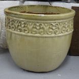 A large glazed terracotta garden plant pot, H50cm