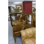 A gold Lloyd Loom bedroom chair, 2 gold Lloyd Loom tables, and a red Lloyd Loom laundry basket