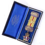 An early 20th century enamel silver-gilt Order of The Buffalos Masonic jewel, presented to Boxall,