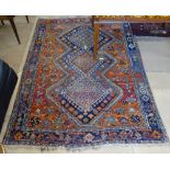 An orange ground Afghan design rug