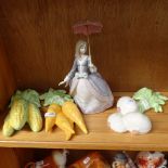 A Lladro porcelain woman with parasol, height 21cm, and 3 ceramic vegetable ornaments (4)