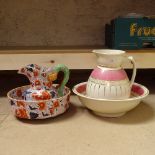 A pink and cream wash jug and basin, and a reproduction Imari style wash jug and bowl