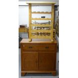 A beech wine rack, and a stained wood side cabinet