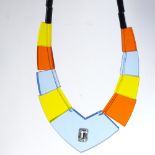 A Vintage multi-colour transparent perspex panel costume necklace, inset paste stone in central