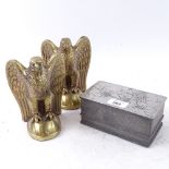 A pair of brass golden eagle bookends, and a Chinese Kut Hing Swatow pewter lidded box (3)
