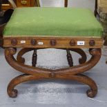 A Victorian mahogany and silk upholstered stool, on X-shaped base, W54cm
