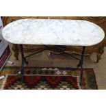 A oval white and grey veined marble-top garden table, on cast-iron base, L120cm