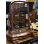 A 19th century mahogany swing toilet mirror, with 2 pull-out drawers, and rising centre section,