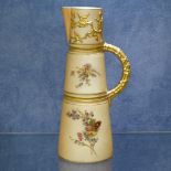 A Royal Worcester peach ground jug, no. 1047, with painted and gilded floral sprays, 22cm