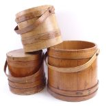 A set of 3 Vintage bentwood grain measures with swing handles, largest diameter 29cm (3)