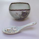 A Japanese porcelain bowl and spoon, with painted and gilded floral decoration, signed, 9.5cm across