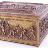 A Victorian brass-bound jewel box, relief embossed village scenes, unmarked, length 20cm