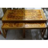 A mid-century teak-framed rectangular nest of 3 tables, with tile top