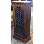 A hardwood CD cabinet of narrow size, with wrought-iron grill panelled door, W33cm