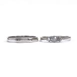 An 18ct white gold 3-stone diamond ring, total diamond content approx 0.2ct, and an 18ct white