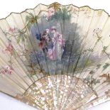 A 19th century French mother-of-pearl and hand painted silk fan, depicting 2 lovers in a garden,