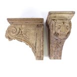 A pair of 17th century carved oak lion mask design wall brackets, with relief carved fruit and