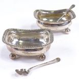 A pair of George III silver table salts, bulbous rectangular form with gadrooned rim and bun feet,
