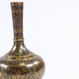 A 19th century Islamic engraved bronze and black enamel water flagon, height 25cm