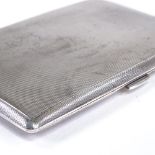 An Elizabeth II rectangular silver cigarette case, allover engine turned decoration, by S J Rose &