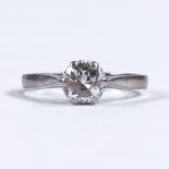 An early 20th century 18ct white gold 0.72ct solitaire diamond ring, platinum topped settings,
