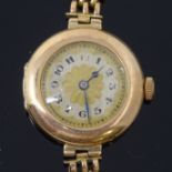 A lady's Vintage 9ct gold mechanical dress wristwatch, gilt dial with painted Arabic numerals, blued