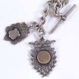 An early 20th century silver Albert chain, with 2x dog clips, 1x T-Bar and 2x silver fobs, by