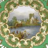 A pair of 19th century fine hand painted and gilded cabinet plates, depicting Irish scenes, the Holy