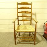 An Arts and Crafts ladder-back armchair by Philip Clissett, circa 1890