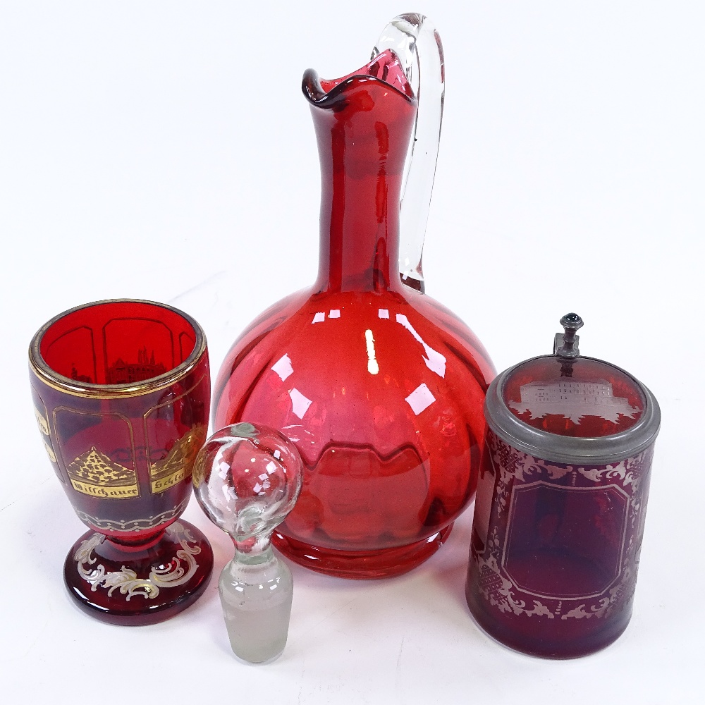 A Victorian ruby glass Claret jug, a Bohemian ruby overlay glass tankard, and a Bohemian ruby - Image 3 of 3
