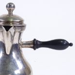 An early 19th century French silver side-handled coffee pot, baluster form with bright-cut