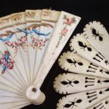 2 19th century miniature ivory doll's brise fans, one with hand painted flowers, length 5.5cm, the