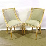 A pair of carved and stained wood-framed salon chairs