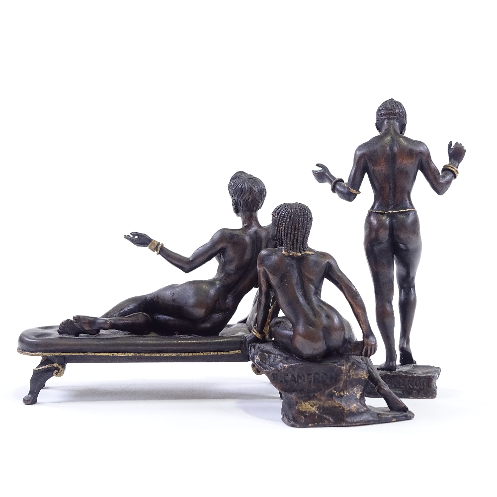 Ronald Cameron (1930 - 2013), a set of 3 miniature patinated and parcel gilt-bronze naked Nubian - Image 2 of 3