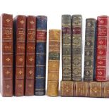 A group of leather-bound books, including Sports and Pastimes by J Strutt 1834, and Peter's
